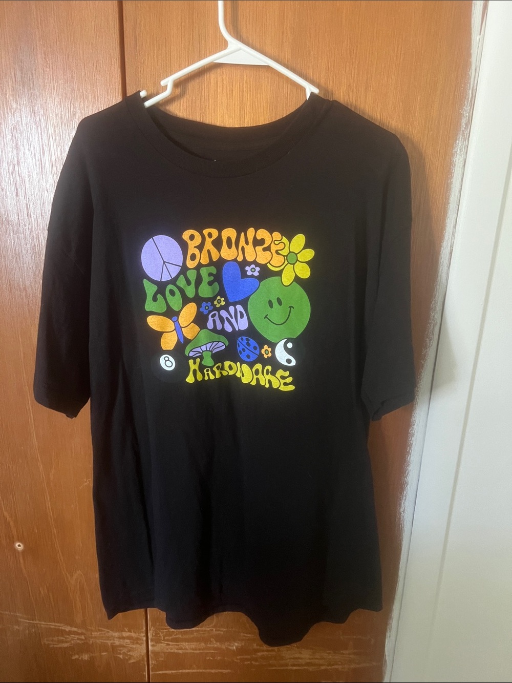 Bronze “Peace, Love, & Hardware” Tee